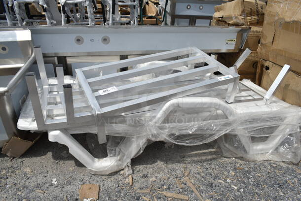 4 BRAND NEW SCRATCH AND DENT! Items; 1 White Resin Chaise Lounger and 3 Aluminum Dunnage Racks Including Regency 600DUN2036, Regency 600DUN1448, Regency 600DUN122060. See Pictures For Damage. 4 Times Your Bid! - Image 2 of 12