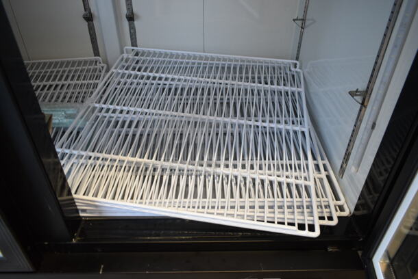 BRAND NEW SCRATCH AND DENT! 2024 Avantco 178GDC49HCB 53" Black Customizable Swing Glass Door Merchandiser Refrigerator with LED Lighting and Poly Coated Racks. 115 Volts, 1 Phase. Tested and Powers On But Does Not Get Cold - Image 5 of 10