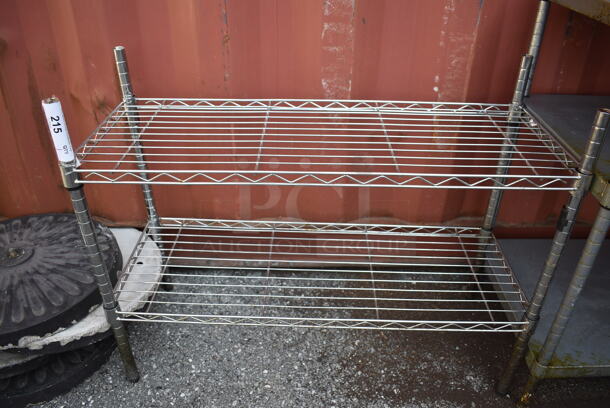 Chrome Finish 2 Tier Shelving Unit. BUYER MUST DISMANTLE. PCI CANNOT DISMANTLE FOR SHIPPING. PLEASE CONSIDER FREIGHT CHARGES. 36x14x28 - Image 1 of 3