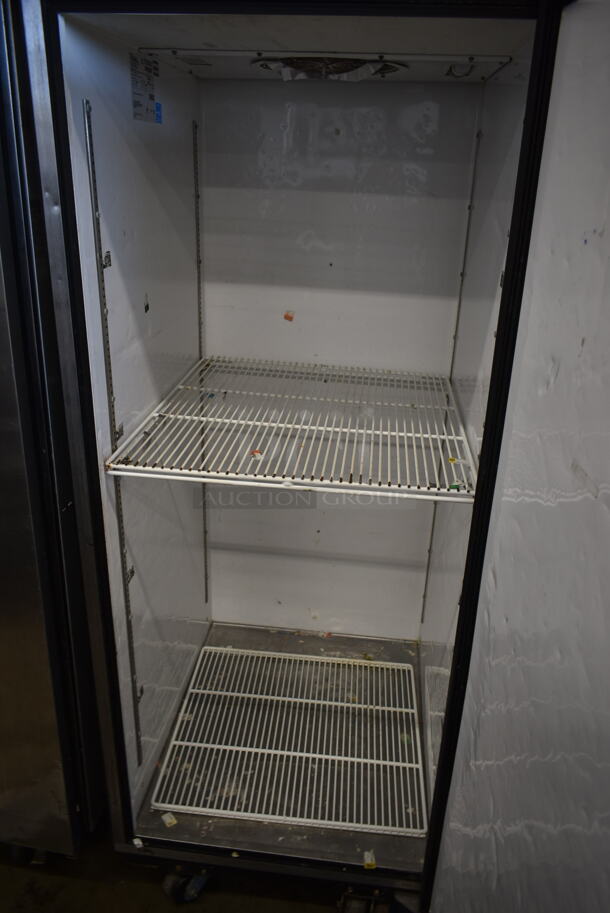2013 True TG1R-1S ENERGY STAR Stainless Steel Commercial Single Door Reach In Cooler w/ Poly Coated Racks on Commercial Casters. 115 Volts, 1 Phase. Tested and Working! - Image 5 of 7