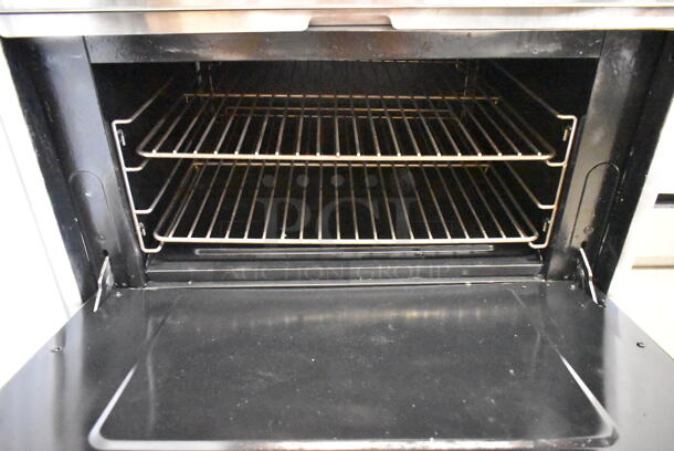Pantin Stainless Steel Commercial Natural Gas Powered 6 Burner Range w/ Oven and Back Splash.  - Image 4 of 4