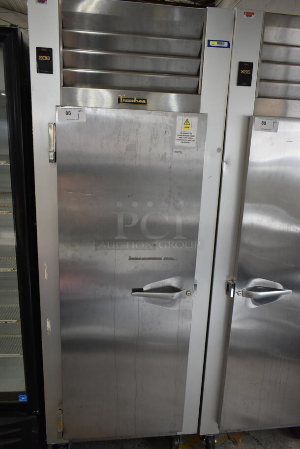 Traulsen G10011 ENERGY STAR Stainless Steel Commercial Single Door Reach In Cooler w/ Poly Coated Racks on Commercial Casters. 115 Volts, 1 Phase. Tested and Working!