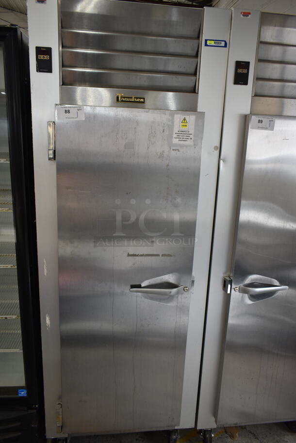 Traulsen G10011 ENERGY STAR Stainless Steel Commercial Single Door Reach In Cooler w/ Poly Coated Racks on Commercial Casters. 115 Volts, 1 Phase. Tested and Working! - Image 1 of 5