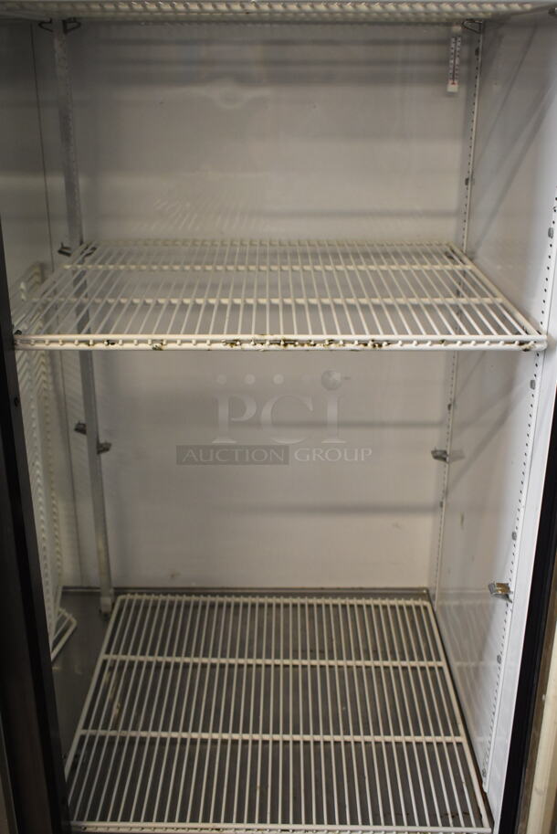 True T-72G Stainless Steel Commercial 3 Door Reach In Cooler Merchandiser w/ Poly Coated Racks on Commercial Casters. 115 Volts, 1 Phase. Tested and Working! - Image 3 of 6