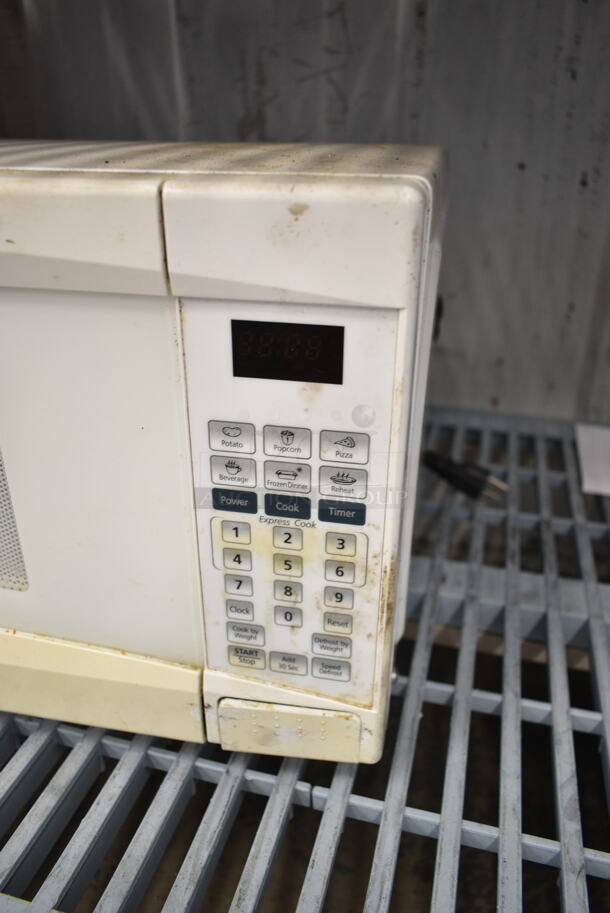 2 Items Including Impecca CM-0774W Countertop Microwave Oven w/ Plate and Metal Countertop Scale. 2 Times Your Bid!  - Image 6 of 8