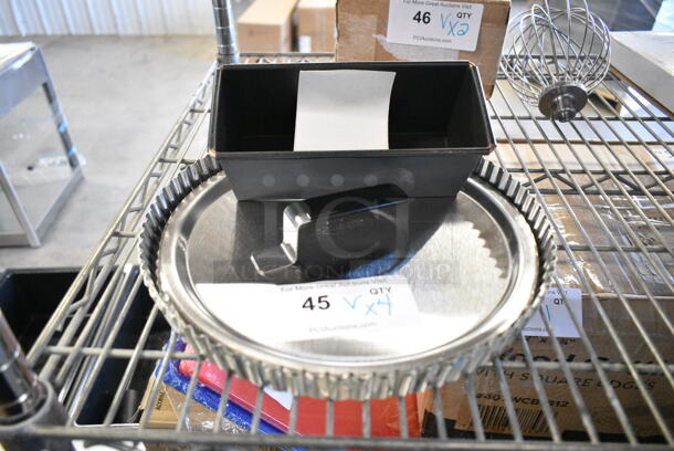 4 BRAND NEW SCRATCH AND DENT! Items Including Vollrath 69410 Tribute 10 9/16" Cover with Welded Torogard Heat Resistant Handle, 980331074 Matfer Bourgeat 331074 Exopan Steel Non-Stick Bread Loaf Pan - 8" x 3 1/8" x 3 1/8", 2 9804770232 Gobel 11 3/4" x 1" Round Fluted Tin-Plated Steel Tart / Quiche Pan with Removable Bottom 126442. 4 Times Your Bid!  - Image 1 of 8