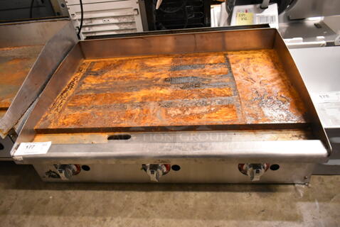 APW Wyott Stainless Steel Commercial Countertop Natural Gas Powered Flat Top Griddle. 