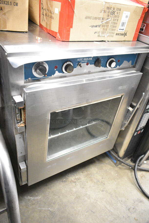 Alto Shaam Halo Heat Stainless Steel Commercial Electric Powered Cook N Hold Cabinet on Commercial Casters.  - Image 1 of 5