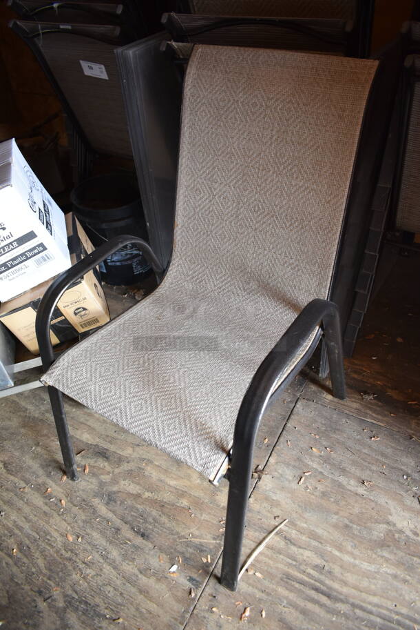 10 Light Brown / Tan Patio Chairs on Black Metal Frame. Stock Picture - Cosmetic Condition May Vary. 10 Times Your Bid! (outside shed) - Image 2 of 3