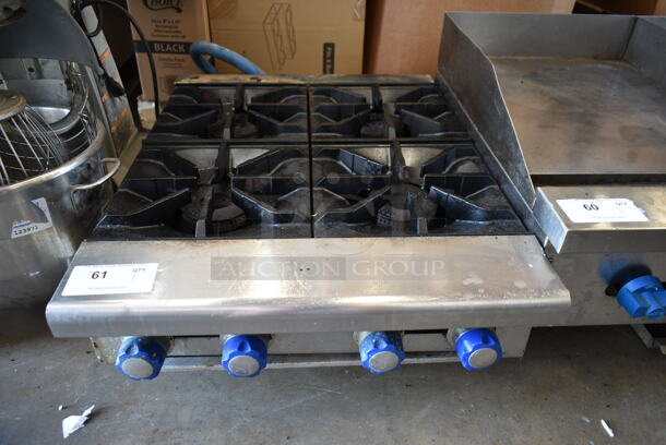 Stainless Steel Commercial Countertop Natural Gas Powered 4 Burner Range.  - Image 1 of 4