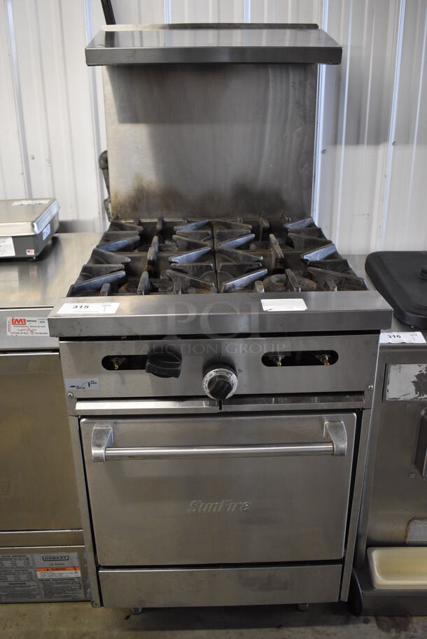 Garland SunFire Stainless Steel Commercial Natural Gas Powered 4 Burner Range w/ Oven, Over Shelf and Back Splash. 23.5x35x57