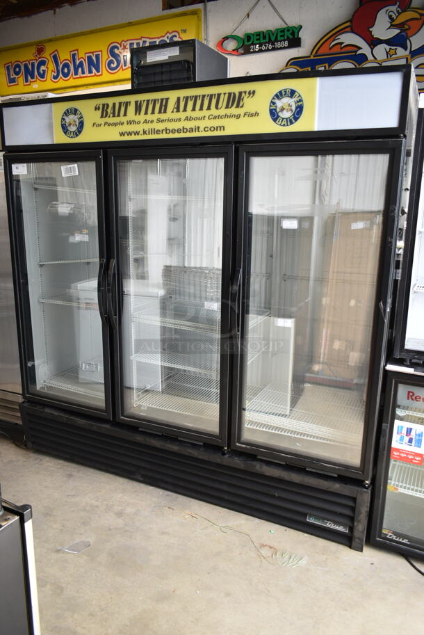 2018 True GDM-72F-HC Metal Commercial 3 Door Reach In Freezer Merchandiser w/ Poly Coated Racks. 115-208/230 Volts, 1 Phase.  - Image 1 of 5