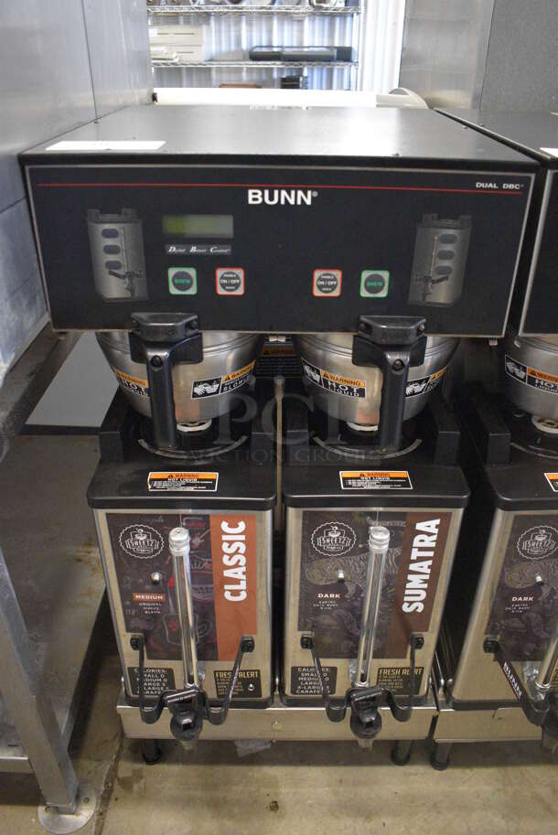 2012 Bunn Model DUAL SH DBC Stainless Steel Commercial Countertop Dual Coffee Machine w/ 2 Stainless Steel Brew Baskets and 2 Bunn Model SH SERVER Satellite Servers. 120/208-240 Volts, 1 Phase. 18x24x36. Tested and Working!