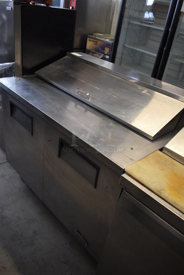 True TSSU-48-12 Stainless Steel Commercial Sandwich Salad Prep Table Bain Marie Mega Top on Commercial Casters. 115 Volts, 1 Phase. 48x30x43. Tested and Powers On But Does Not Get Cold
