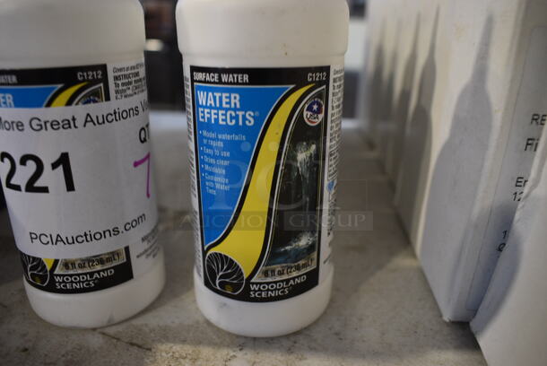 7 C1212 Water Effects Surface Water Bottles. 2x2x7. 7 Times Your Bid! - Image 2 of 3