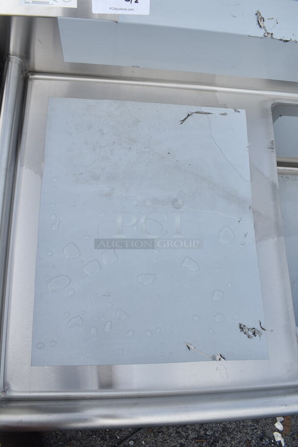 BRAND NEW SCRATCH AND DENT! Regency 600S22424224 98" 16 Gauge Stainless Steel Two Compartment Commercial Sink with Stainless Steel Legs, Cross Bracing, and 2 Drainboards - 24" x 24" x 14" Bowls. No Legs.  - Image 7 of 8