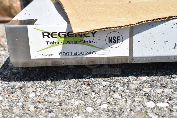 BRAND NEW SCRATCH AND DENT! Regency 600TB3024G 30" x 24" 18-Gauge 304 Stainless Steel Equipment Filler Table with Backsplash and Galvanized Undershelf - Image 5 of 5