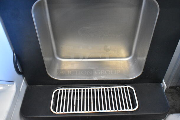Wellspring Model SSI-143S Stainless Steel Commercial Floor Style Air Cooled 2 Flavor w/ Twist Soft Serve Ice Cream Machine on Commercial Casters. 220 Volts, 1 Phase.  - Image 3 of 7