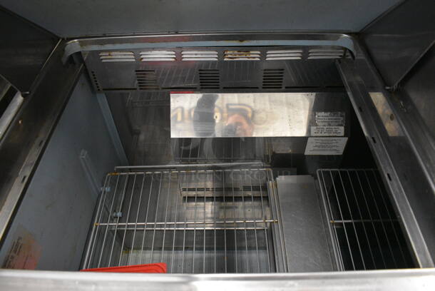 2010 Delfield 4472N-30M Stainless Steel Commercial Sandwich Salad Prep Table on Commercial Casters. 115 Volts, 1 Phase. 72x30x45.5. Tested and Powers On But Does Not Get Cold - Image 6 of 11