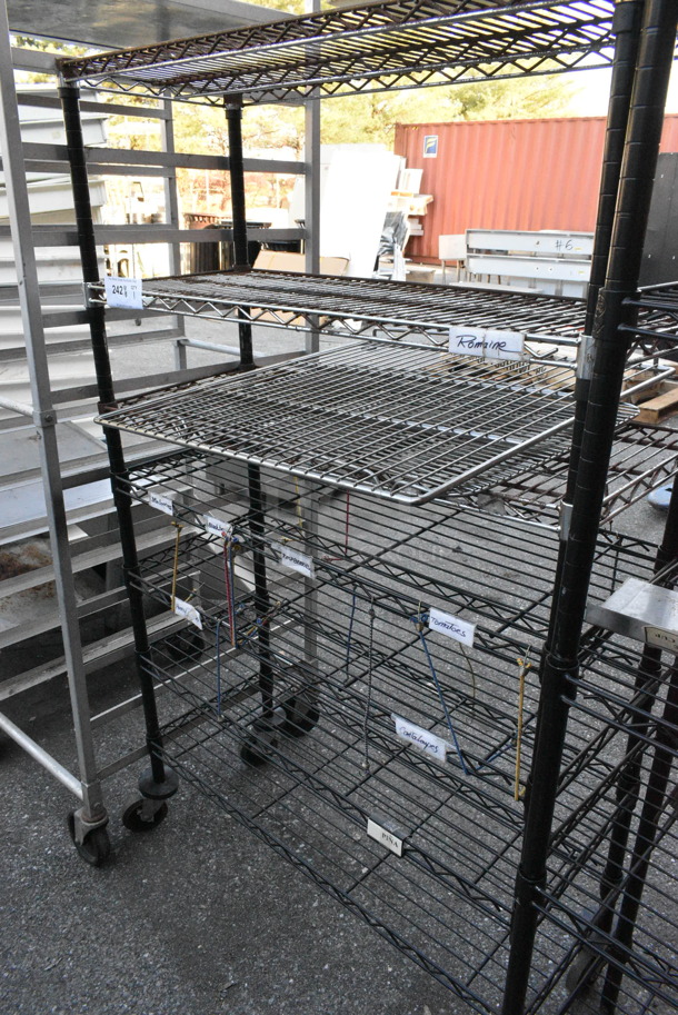 Black Finish 7 Tier Wire Shelving Unit on Commercial Casters. BUYER MUST DISMANTLE. PCI CANNOT DISMANTLE FOR SHIPPING. PLEASE CONSIDER FREIGHT CHARGES. - Image 1 of 2