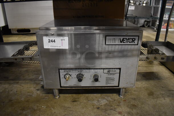 Star Holman 210HX-401 Stainless Steel Commercial Countertop Electric Powered Conveyor Pizza Oven. 120 Volts, 1 Phase. 48x16x14
