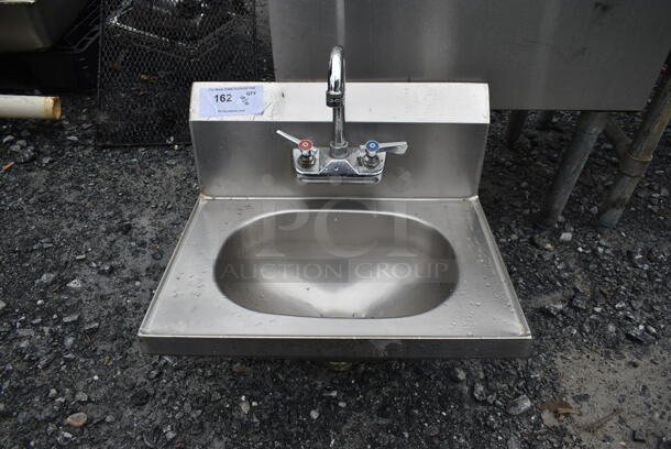 Stainless Steel Commercial Single Bay Wall Mount Sink w/ Faucet and Handles.