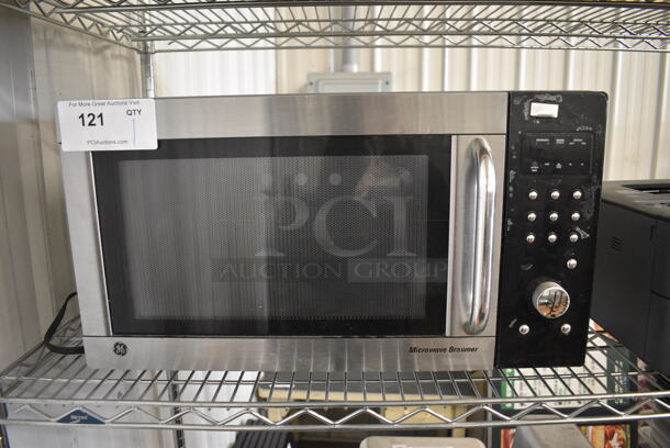 General Electric Model JES1384SF03 Stainless Steel Countertop Microwave Oven w/ Plate. 120 Volts, 1 Phase. 22x16x12