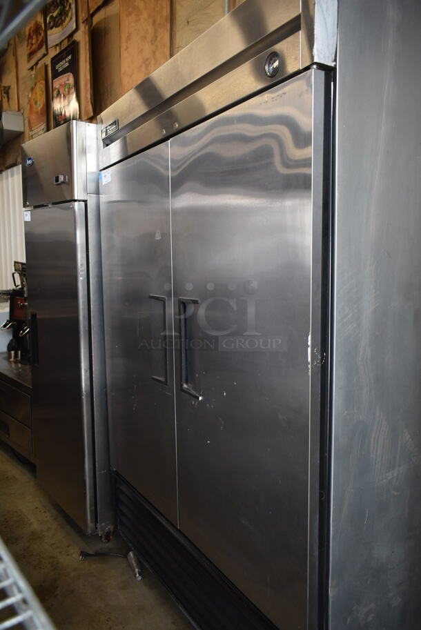 True T-49F ENERGY STAR Stainless Steel Commercial 2 Door Reach In Freezer w/ Poly Coated Racks. 115 Volts, 1 Phase. Tested and Does Not Power On