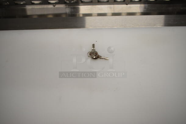BRAND NEW SCRATCH AND DENT! 2024 Avantco 178APT71HC Stainless Steel Commercial 70" 3 Door Refrigerated Sandwich Prep Table on Commercial Casters. 115 Volts, 1 Phase. Tested and Working!  - Image 11 of 12