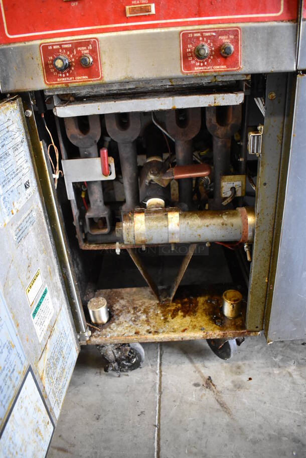 Vulcan 30RD45 Stainless Steel Commercial Floor Style Natural Gas Powered 2 Bay Deep Fat Fryer w/ Center Dumping Station on Commercial Casters. Missing Caster. 240,000 BTU. 47x35x58 - Image 9 of 12