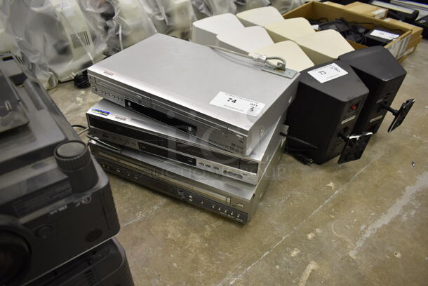 3 DVD / VHS Players Including Zenith XBV443. 3 Times Your Bid! (Main Building)