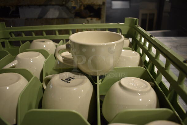 11 White Ceramic Mugs in Green Dish Caddy. 5x3.5x2.75. 11 Times Your Bid!