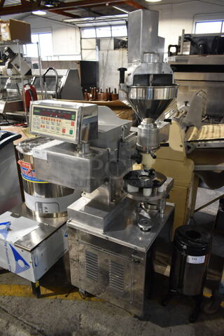 Anko Model SD-97B Stainless Steel Commercial Floor Style Automatic Encrusting and Forming Machine on Commercial Casters. 220 Volts, 1 Phase. 