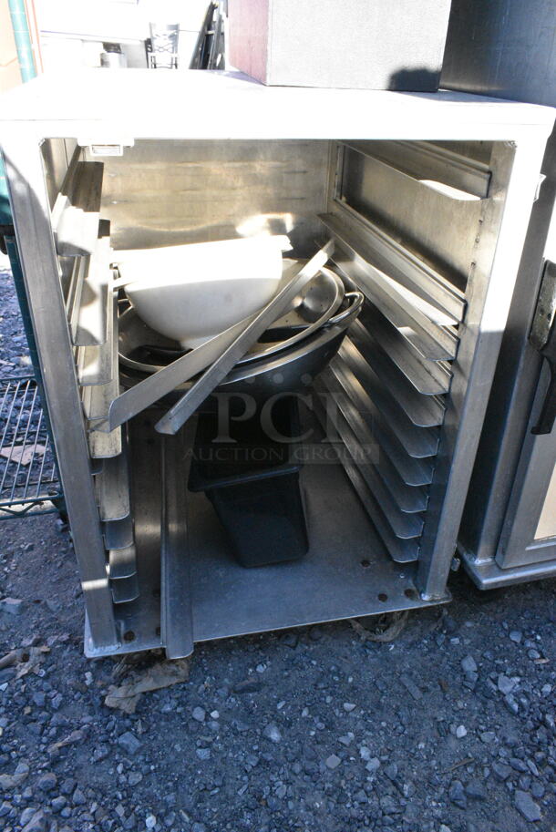 Metal Commercial Pan Transport Rack on Commercial Casters w/ Contents Including Metal Bowl, Colander.  - Image 1 of 2