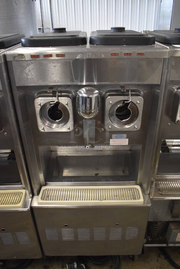 Taylor Model 342D-27 Stainless Steel Commercial Floor Style Air Cooled 2 Flavor Frozen Beverage Machine w/ Drink Mixer Attachment on Commercial Casters. Missing Pieces. 208-230 Volts, 1 Phase. 26x34x60