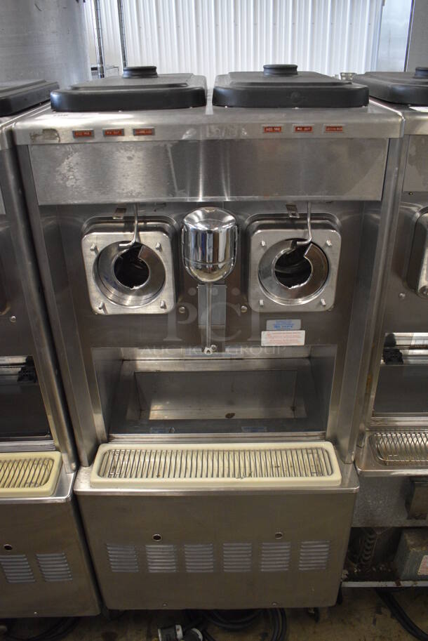 Taylor Model 342D-27 Stainless Steel Commercial Floor Style Air Cooled 2 Flavor Frozen Beverage Machine w/ Drink Mixer Attachment on Commercial Casters. Missing Pieces. 208-230 Volts, 1 Phase. 26x34x60 - Image 1 of 7
