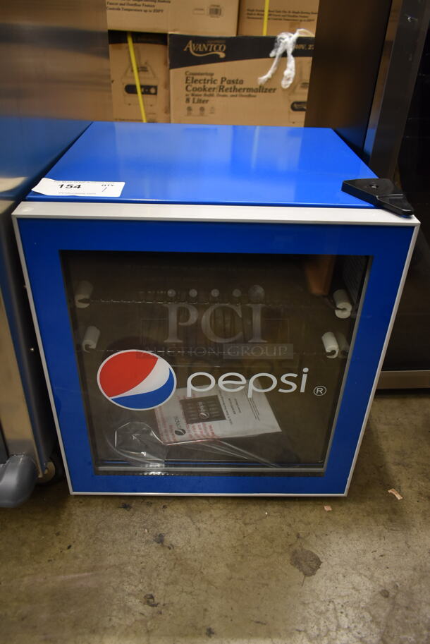 BRAND NEW SCRATCH AND DENT! Curtis  MIS165PEP-6COM Pepsi Mini Beverage Cooler Merchandiser, 70 Can or 17 Bottles Drinks Fridge with Glass Door for Soda + Adjustable Thermostat. 1.8 cu.. 115 Volts, 1 Phase. Tested and Working! - Image 1 of 4