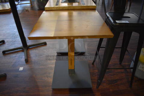 4 Wooden Tables on Metal Table Base. 24x24x29. 4 Times Your Bid! (lounge)