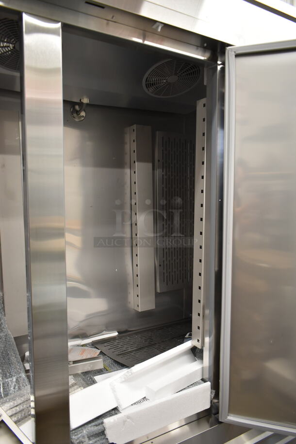BRAND NEW SCRATCH AND DENT! 2023 Avantco 178SS3FHC Stainless Steel Commercial 3 Door Reach In Freezer w/ Poly Coated Racks on Commercial Casters. 115 Volts, 1 Phase. Tested and Working! - Image 7 of 11