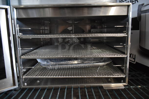 BRAND NEW SCRATCH AND DENT! Avantco 177LT06A Stainless Steel Commercial Food Dehydrator. 120 Volts, 1 Phase. Tested and Only Works On The Highest Heat Setting.
 - Image 8 of 10