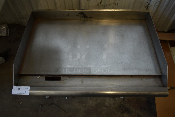 APW Wyott Stainless Steel Commercial Countertop Natural Gas Powered Flat Top Griddle.  - Image 3 of 7