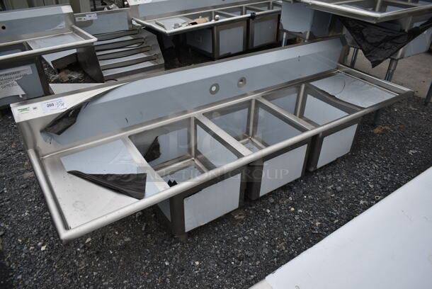 BRAND NEW SCRATCH AND DENT! Regency 600S31620218 Stainless Steel Commercial 3 Bay Sink w/ Dual Drain Boards. No Legs. - Image 1 of 5