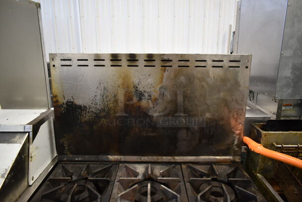 Bakers Pride Stainless Steel Commercial Natural Gas Powered 6 Burner Range w/ Oven and Back Splash on Commercial Casters. - Image 3 of 7