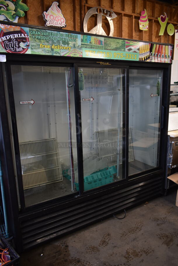 True GDM-69 Metal Commercial 3 Door Reach In Cooler Merchandiser w/ Poly Coated Racks. 115 Volts, 1 Phase. Tested and Working!