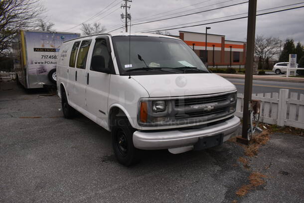 Chevrolet Express Cargo Van. Vehicle Runs and Drives! Odometer Reads 98,320. Title In Hand! See Lot 6 For Additional Pictures - Image 1 of 12
