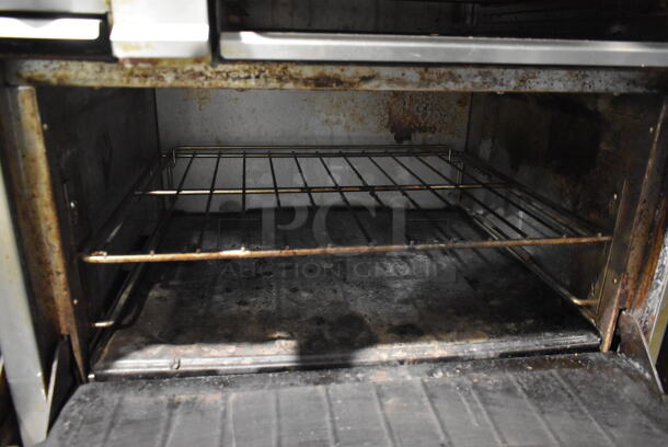 Garland SunFire Stainless Steel Commercial Natural Gas Powered 6 Burner Range w/ Right Side Flat Top Griddle, 2 Ovens, Over Shelf and Back Splash. - Image 7 of 7