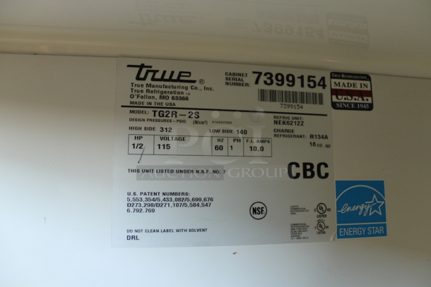 2012 True TG2R-2S ENERGY STAR Stainless Steel Commercial 2 Door Reach In Cooler w/ Poly Coated Racks on Commercial Casters. 115 Volts, 1 Phase. Tested and Working! - Image 7 of 7