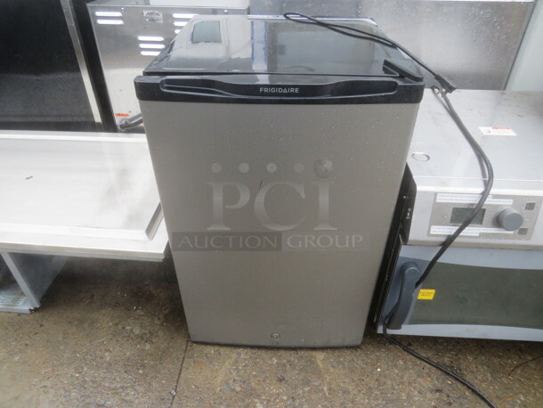 One Frigidaire 1 Door Under Counter Cooler With 2 Racks. #FFPE45L2QM. 21.5X24X34 - Image 1 of 1