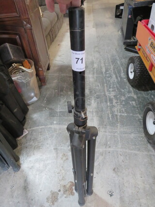 One Tripod Stand.
