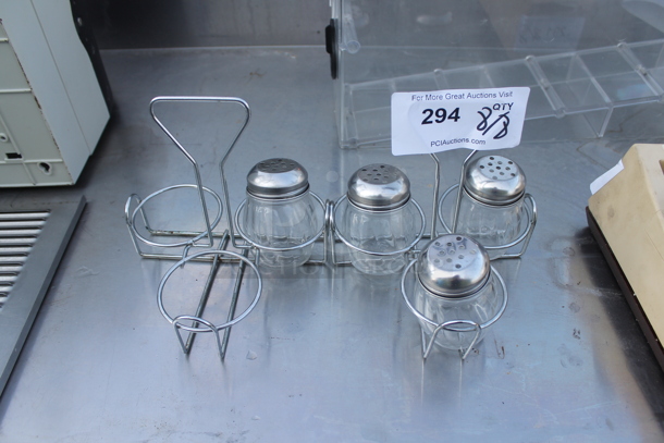 ALL ONE MONEY! Lot of 2 Metal Seasoning Shaker Holders w/ a Total of 4 Seasoning Shakers. - Image 1 of 4